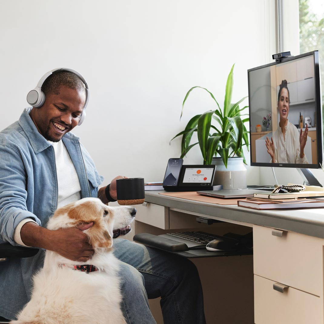 Person enjoys taking a Webex Meeting from home