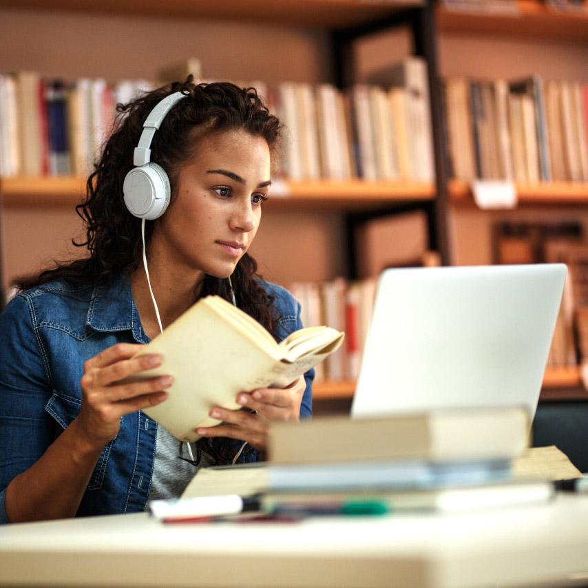 A student studies a recording on Webex