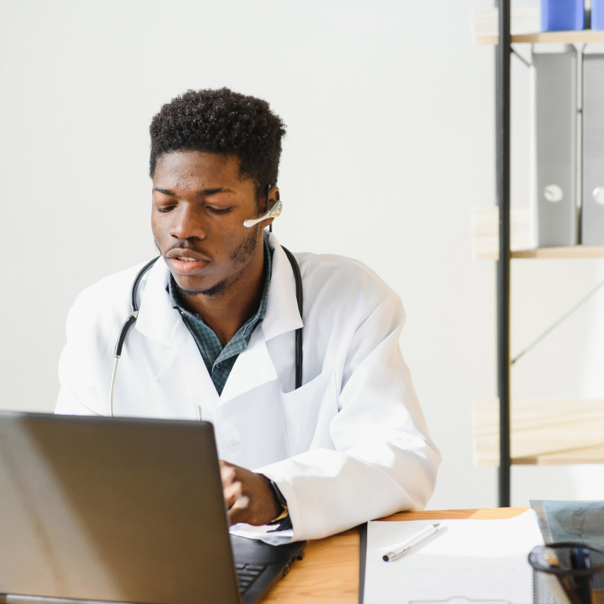 A doctor uses Webex to meet with patients safely and securely